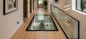 Can Walk-On Glass Be Fitted Into an Existing Hallway Floor?